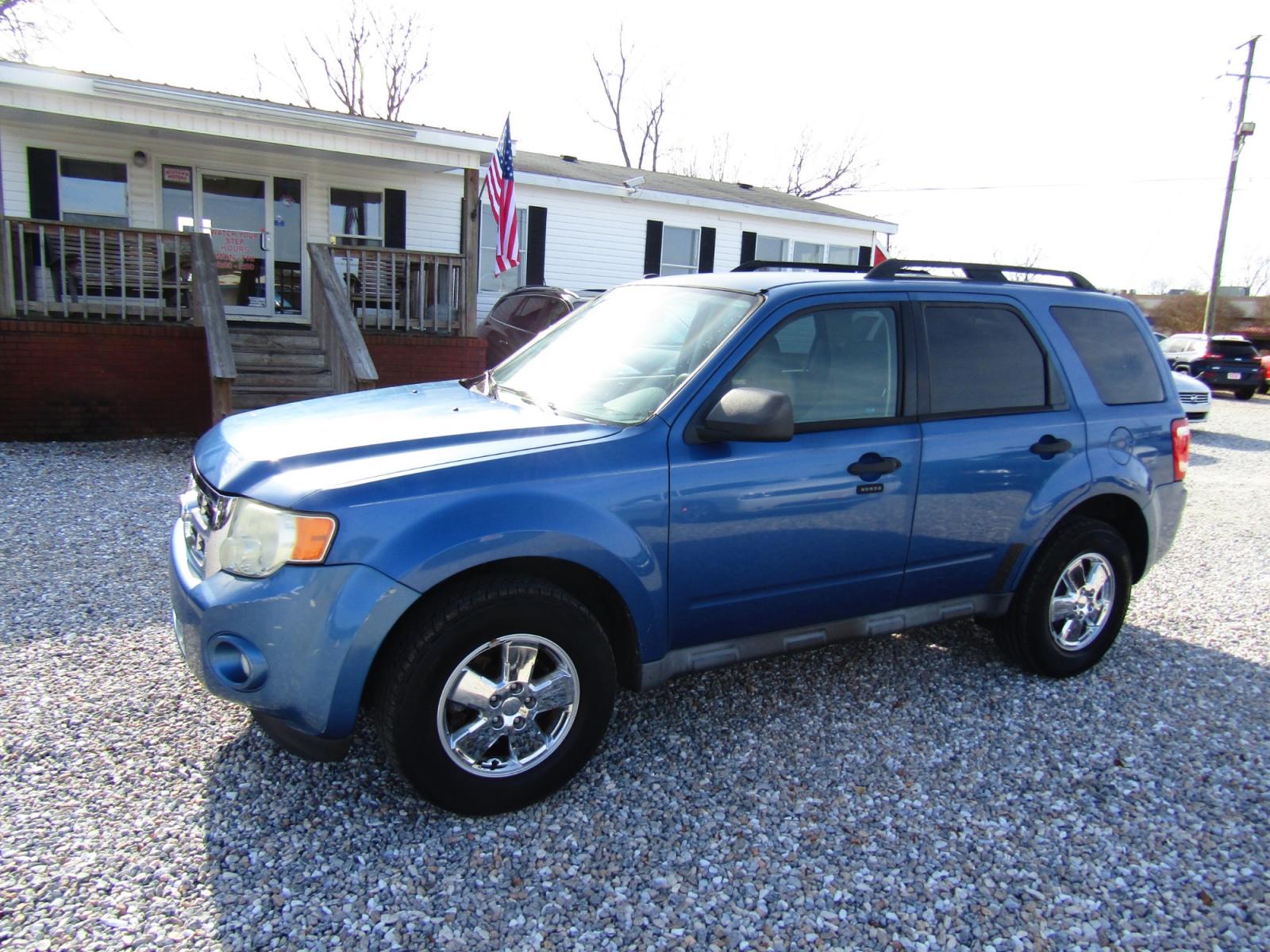 2010 Blue /Black Ford Escape XLT FWD (1FMCU0D72AK) with an 2.5L L4 DOHC 16V engine, Automatic transmission, located at 15016 S Hwy 231, Midland City, AL, 36350, (334) 983-3001, 31.306210, -85.495277 - Photo #2